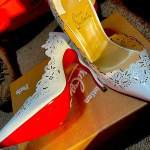 White Christian louboutin heels